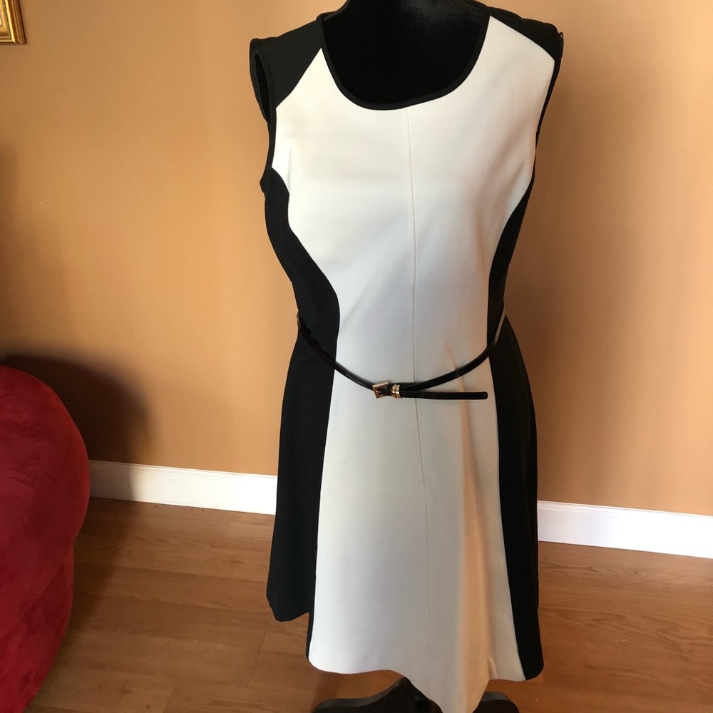 Black and white sleeveless dress with belt. Size M